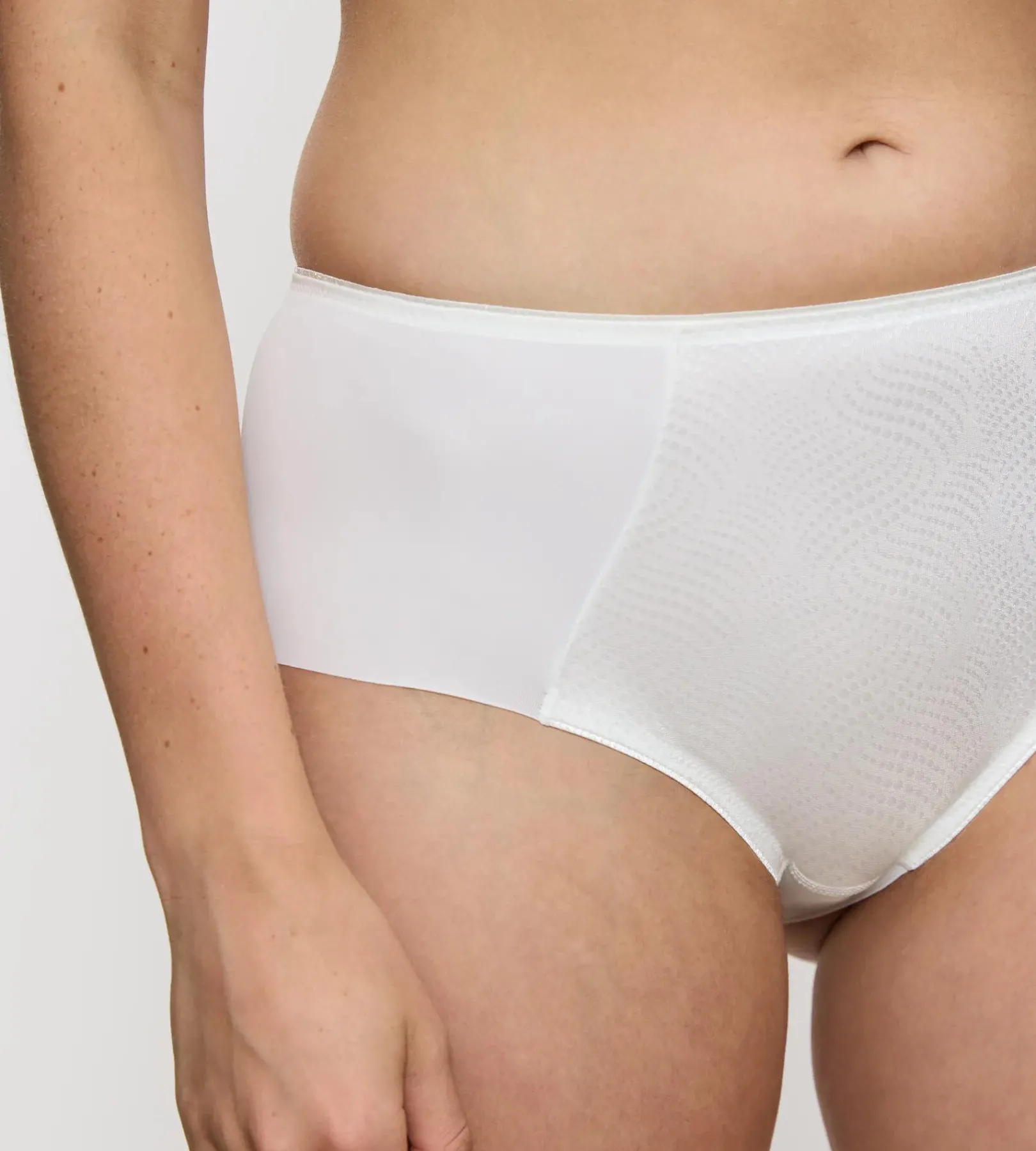 Triumph ESSENTIAL MINIMIZER