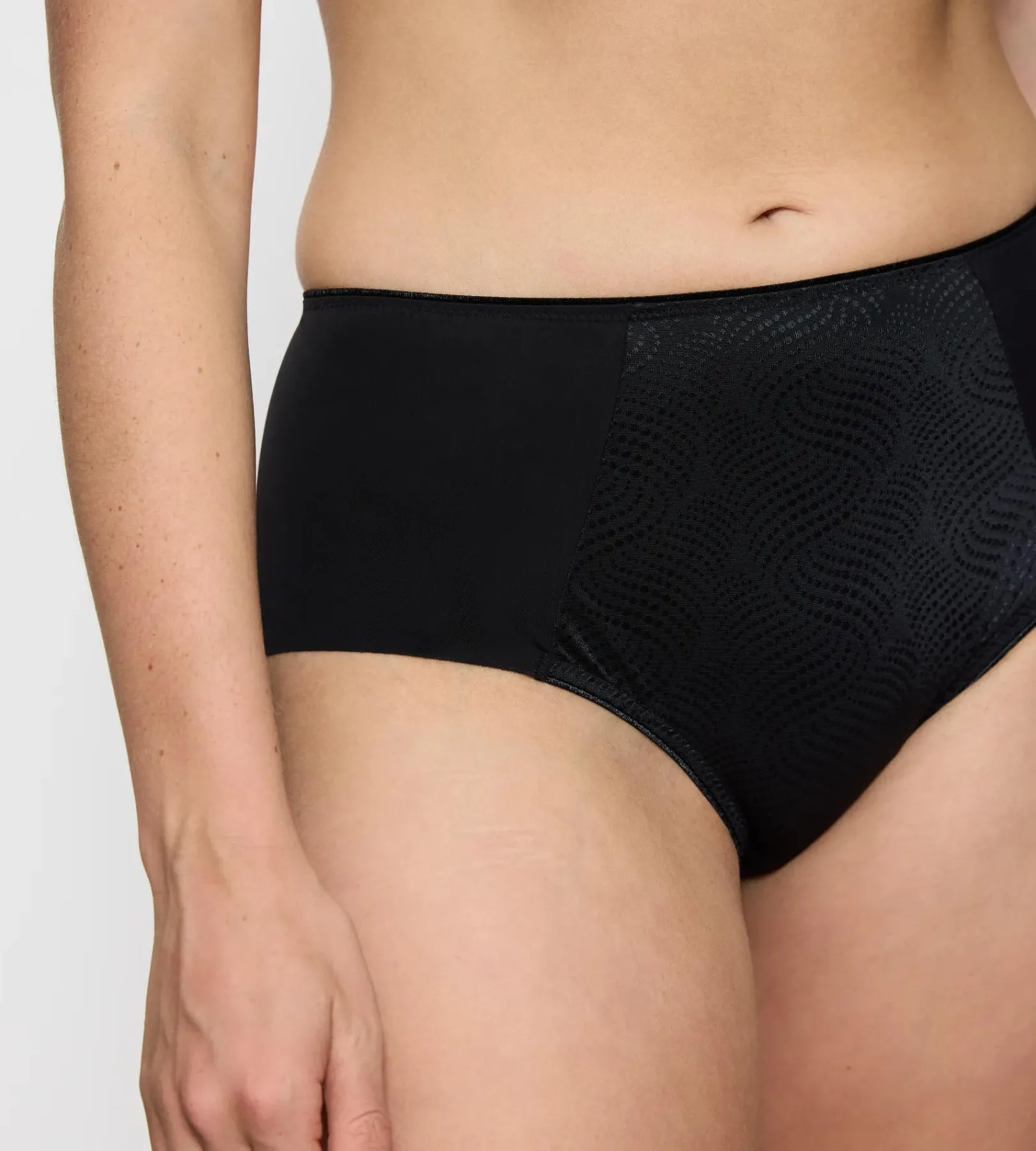 Triumph ESSENTIAL MINIMIZER